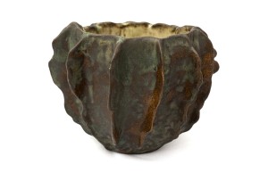 Small copper-glazed vessel with vertical ribs