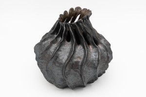 Handbuilt vase with metallic glaze